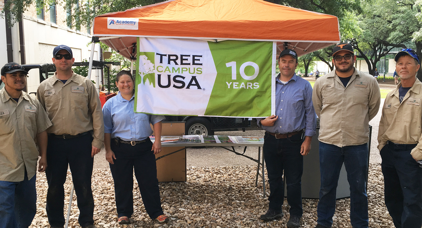 Arborists celebrating Tree Campus USA