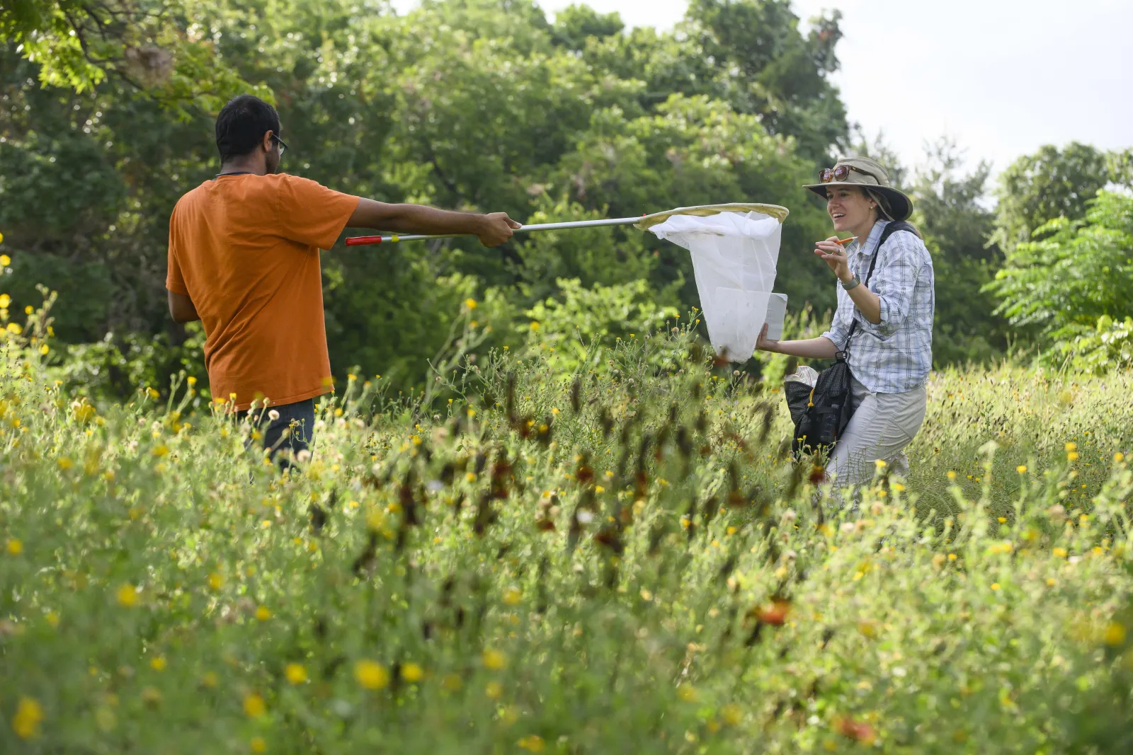 The student is entering sophomore Sahran Hashim, shown here working with Professor Susan Cameron Devitt, at a site along Lady Bird Lake, west of Lamar Blvd.