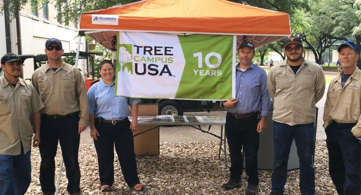 Arborists celebrating Tree Campus USA